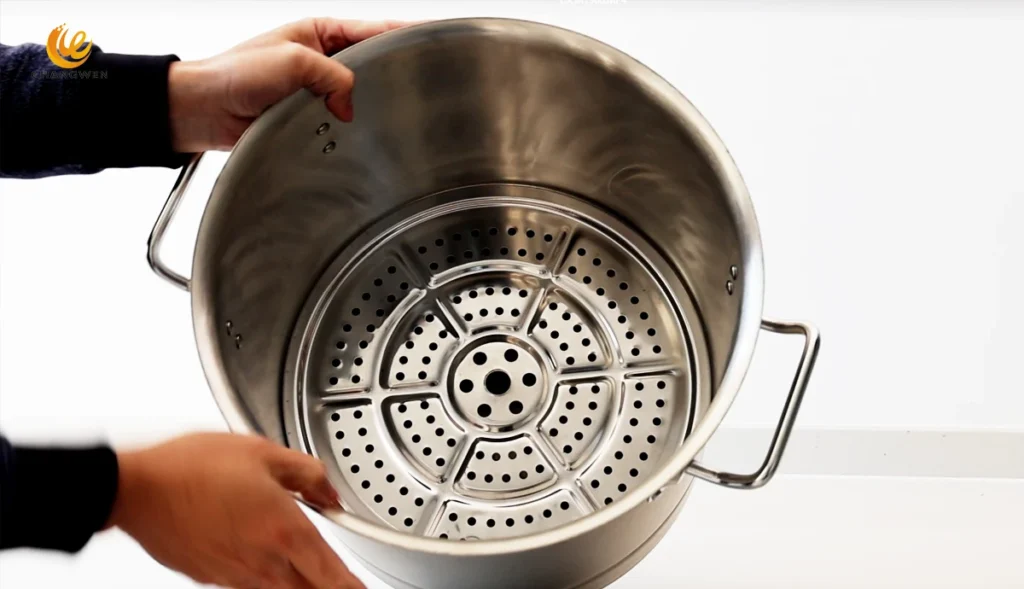 Stainless steel soup pot with steamer